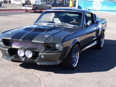 1972 Ford Ranchero - This classic Mustang features a prominent grille with fog lights and wide tires.