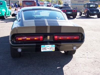 1972 Ford Ranchero - Rear view of a 1969 Ford Mustang Shelby GT500, showing its distinctive taillights and racing stripes.