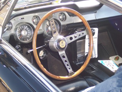 1972 Ford Ranchero - Interior view of a 1967 Shelby GT500, a wood-rimmed steering wheel and classic dashboard.