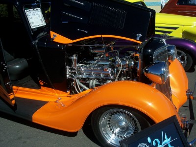 1972 Ford Ranchero - Custom hot rod with engine exposed, parked next to other vehicles at an outdoor event.