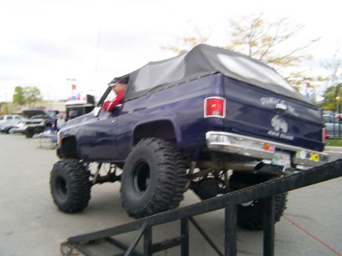 1985 Ford Bronco - This lifted SUV, likely from the late 1970s or early 1980s, is shown ascending a ramp.