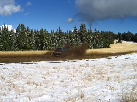 1990 Ford Bronco - Hittin a mud hole along the trail.