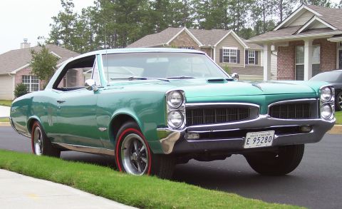 1967 Pontiac Lemans - Green 1967 Pontiac Lemans coupe with redline tires and a South Carolina license plate.
