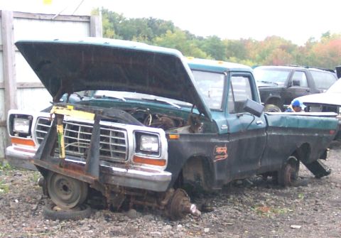 1978 Ford Bronco - This junkyard truck appears to be a Ford F-Series, likely from the late 1970s, with significant damage and missing parts.