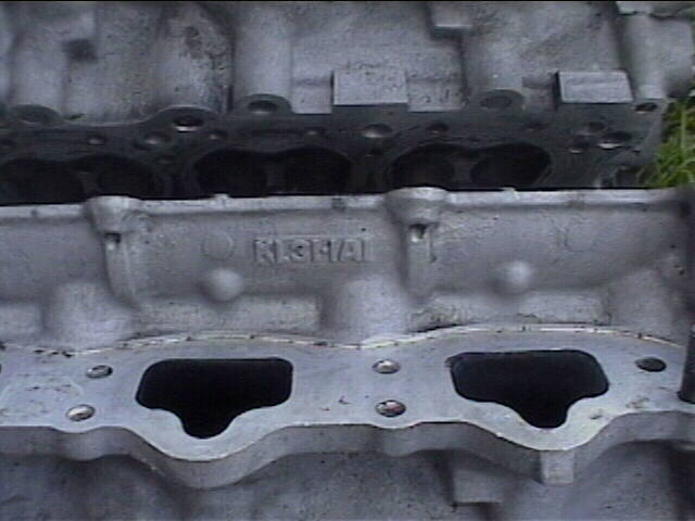 Close-up of an engine block with casting marks visible
