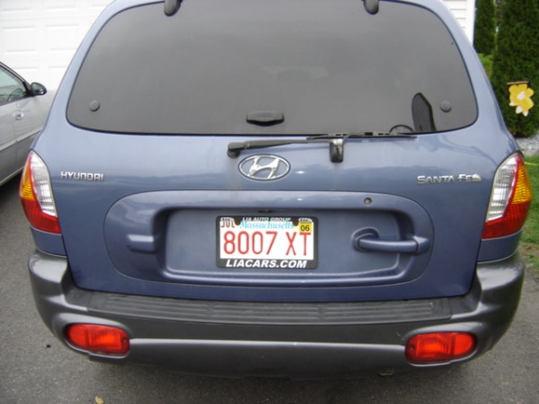 Blue Hyundai Santa Fe rear with license plate 8007 XT