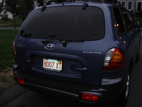 Blue Hyundai Santa Fe rear view, license plate 8007 XT