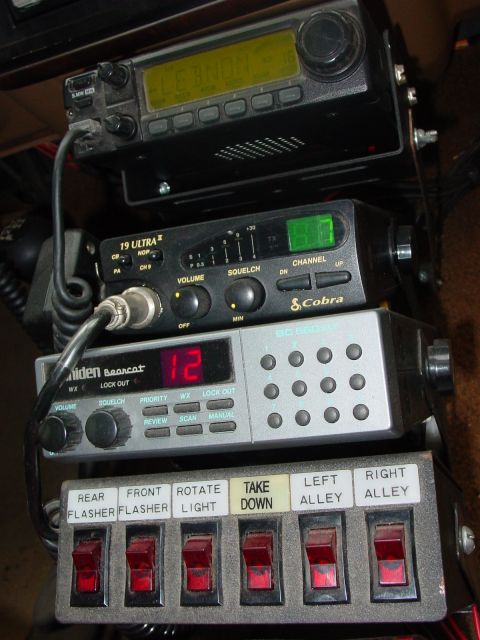 1989 Ford Bronco - Front on view of Icom 2100h, Cobra 19 ultra 2, Uniden BC560XLT, 6 switch box.