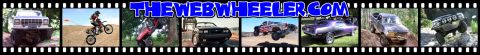 1993 Ford Bronco - This lifted Jeep Cherokee XJ is shown from the front, navigating an off-road trail.