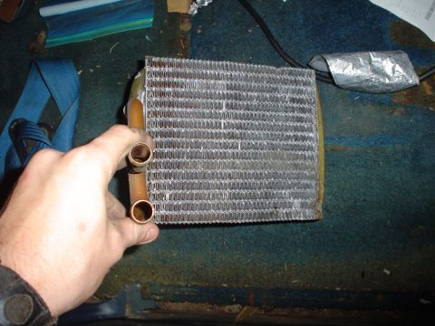 1984 Ford Bronco - Heater core removed from a vehicle's interior during a rebuild.