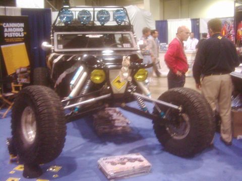 1978 Ford Bronco - This heavily modified off-road buggy is displayed indoors with large tires and a custom front end.