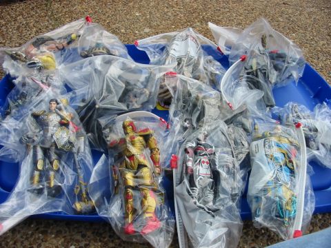 1991 Ford Bronco - Multiple action figures are bagged and displayed on a blue tray.