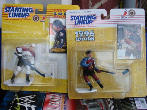 1991 Ford Bronco - Two collectible hockey player toys are displayed in their original packaging, one marked as the 1996 Edition.