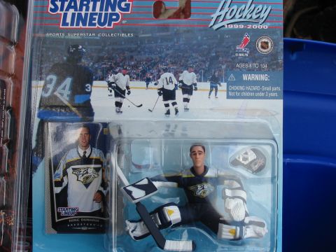 1991 Ford Bronco - Starting Lineup hockey collectible toy packaging from 1999-2000 features player figures and game action.