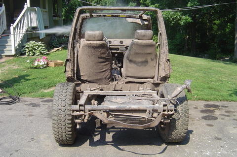 1987 Suzuki Samurai - Power washing a heavily mud-caked 1987 Suzuki Samurai from the rear.