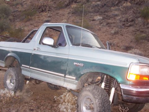 1996 Ford Bronco - This 1996 Ford Bronco is shown off-road with aftermarket suspension and tires.
