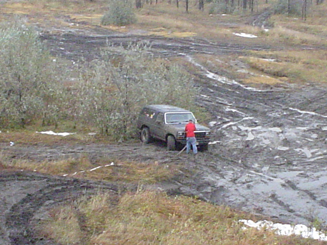 Heres where I was stuck in a rut in the front across both tires.  Im jacking it up to put some wood under the tires.