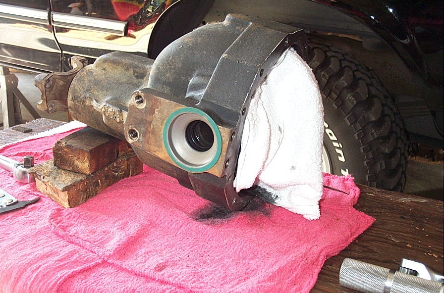 Removed differential center section on a bench with fresh pinion seal, rag stuffed in the housing