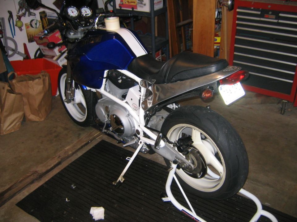 Blue and white motorcycle side view