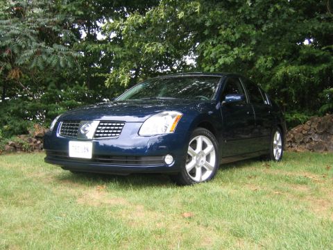 2005 Nissan Maxima - Front 3/4 view of a dark blue 2005 Nissan Maxima sedan.