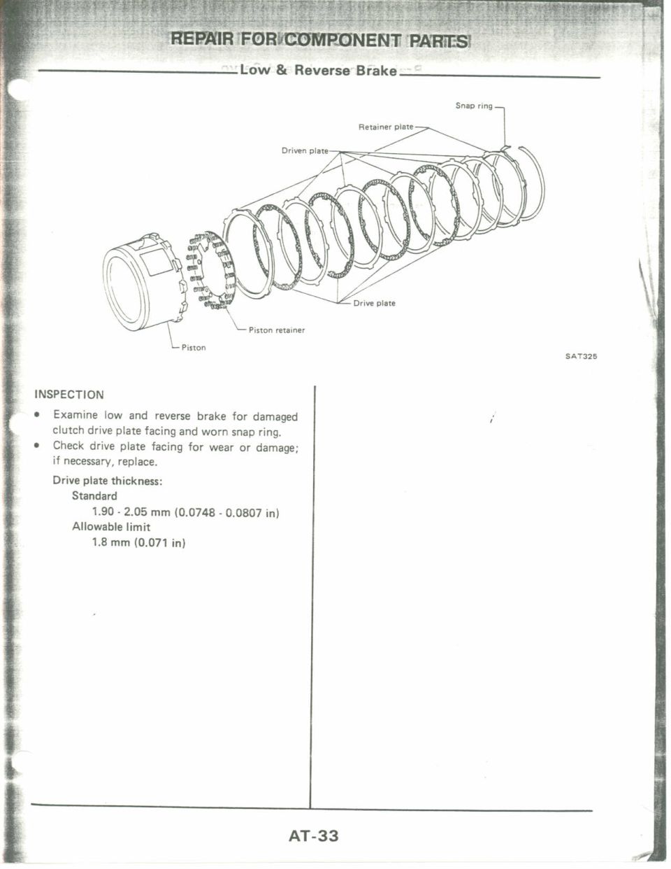 Low and reverse brake exploded diagram showing piston, retainer, drive and driven plates and snap ring stacked