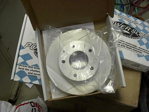 1993 Ford Probe - New Power Slot brake rotor in packaging, ready for installation.