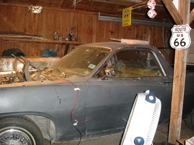 1972 Ford Ranchero - Project 1972 Ford Ranchero sits in a garage with its interior covered and a fan nearby.