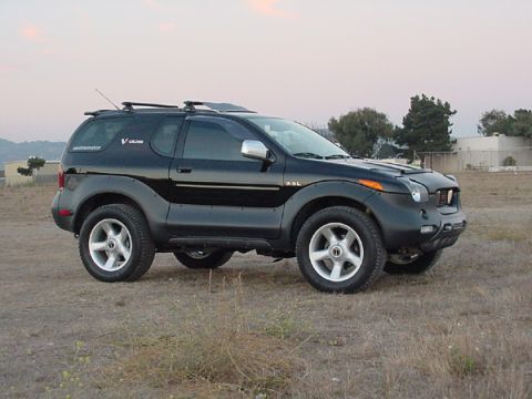 2001 Isuzu Vehicross - A black 2001 Isuzu Vehicross is shown from a three-quarter front angle, parked outdoors.