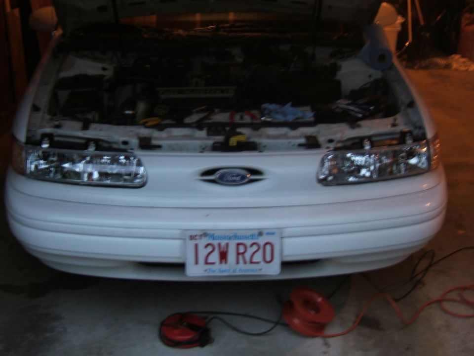 1998 Ford Taurus front with hood open and license plate 12W R20