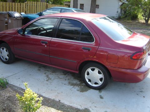 1998 Nissan Sentra - This 1998 Nissan Sentra is shown from the rear quarter angle, parked outdoors.