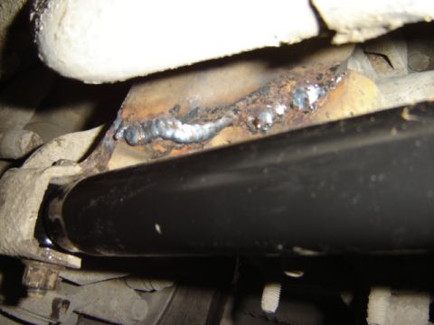 1992 Ford Bronco - This photo shows a welded bracket on the undercarriage of a vehicle, not a 1992 Ford Bronco.