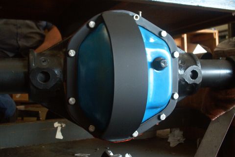 1983 Ford Bronco - A differential cover is shown with a black rock guard installed over it.