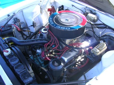 1996 Ford Probe - Close-up of a vehicle's engine bay, an AMX 360 air cleaner and various engine components.