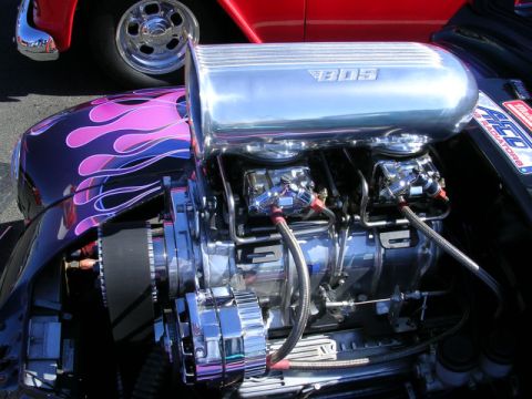 1996 Ford Probe - Custom hot rod engine a BDS supercharger and vibrant flame graphics on the fender.