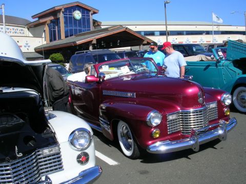 1996 Ford Probe - A gleaming maroon 1941 Cadillac convertible is displayed at the Chinook Winds Car Show 2005.
