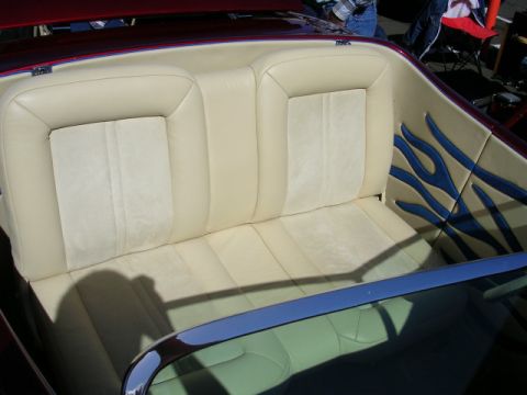 1996 Ford Probe - The custom interior features cream leather seats and striking blue flame accents on the side panels.