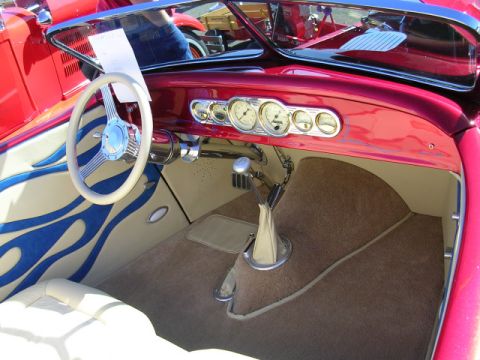 1996 Ford Probe - Custom hot rod interior features flame graphics on the door panels and a classic gauge cluster.
