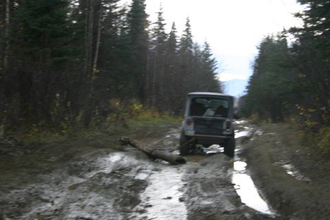 2003 Jeep TJ - Wes tuggin out an old culvert.