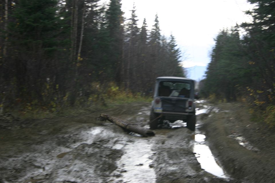 Wes tuggin out an old culvert.