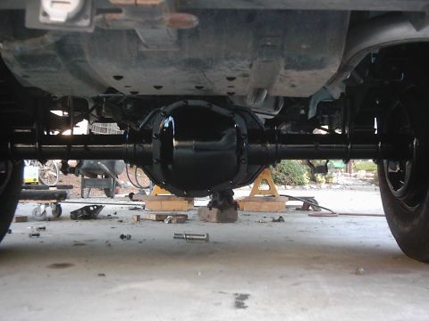 1978 Ford Bronco - Underside view of a vehicle's rear axle differential, which is black and appears to be recently serviced or painted.