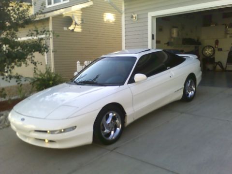 1996 Ford Probe - This 1996 Ford Probe is captured in a three-quarter front view, its coupe body style and sunroof.
