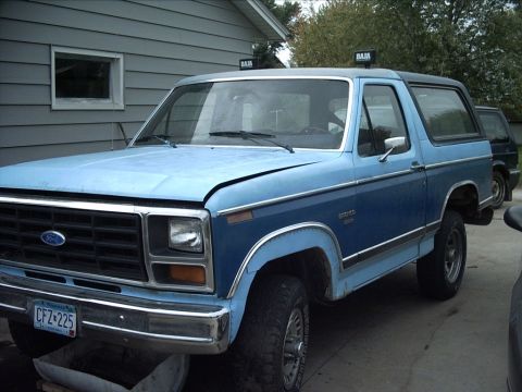 1983 Ford Bronco - This blue 1983 Ford Bronco features Baja lights on the roof and a two-tone paint scheme.
