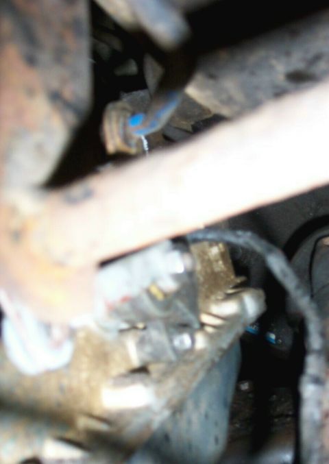 1978 Ford Bronco - Close-up view of an engine component, possibly related to a motor swap, with a visible SuperMotors logo in the corner.