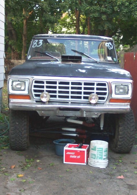 1978 Ford Bronco - 1978 Ford Bronco front view, modified with a hood scoop and auxiliary lights.