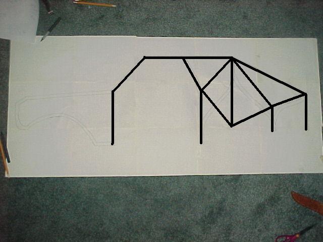 Hand-drawn roll cage tubing design sketched over a vehicle profile outline on paper