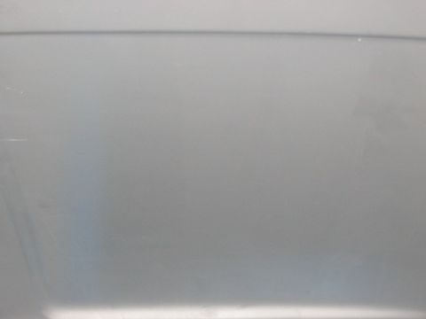 1991 Ford Bronco - Close-up of a vehicle's interior panel, showing a subtle horizontal line detail.