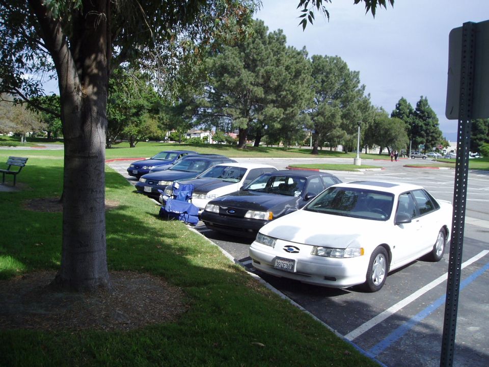 White 1993 Ford Taurus sedan parked in a lot