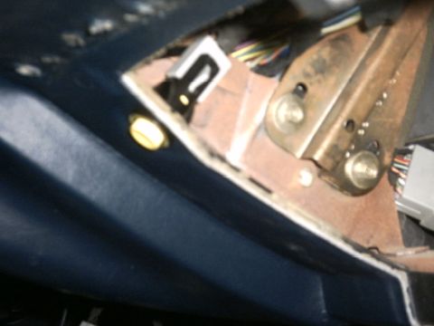 1991 Ford Crown Victoria LTD - Interior view of car wiring harness and mounting bracket, likely under the dashboard.