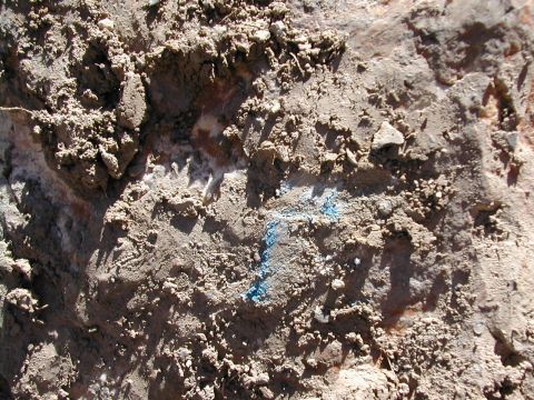 1994 Ford Bronco - Dirt and rocks with blue chalk marks visible.