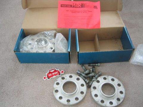 1993 Ford Probe - H&R wheel spacers and bolts are shown in their packaging with instructions.